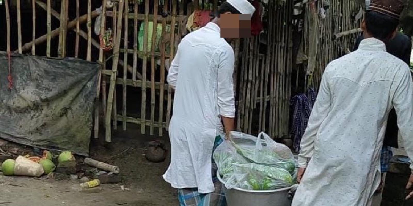 Students carry sorted bags of vegetables for distribution